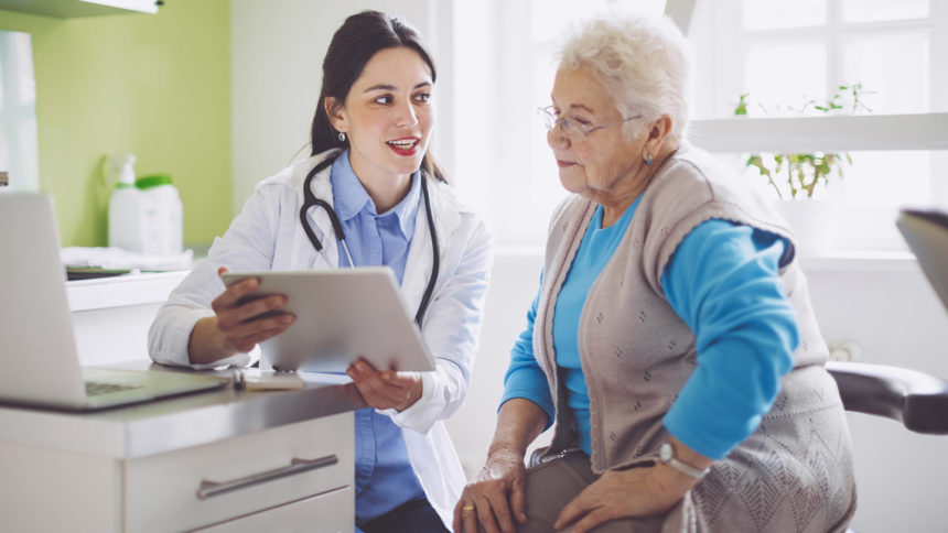 Image of doctor consulting her patient